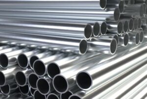 Hot Dipped GI Seamless Pipes, stacked as a pile with mirror looks.