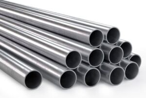 Hot Dipped GI Seamless Pipes, stacked as a pile