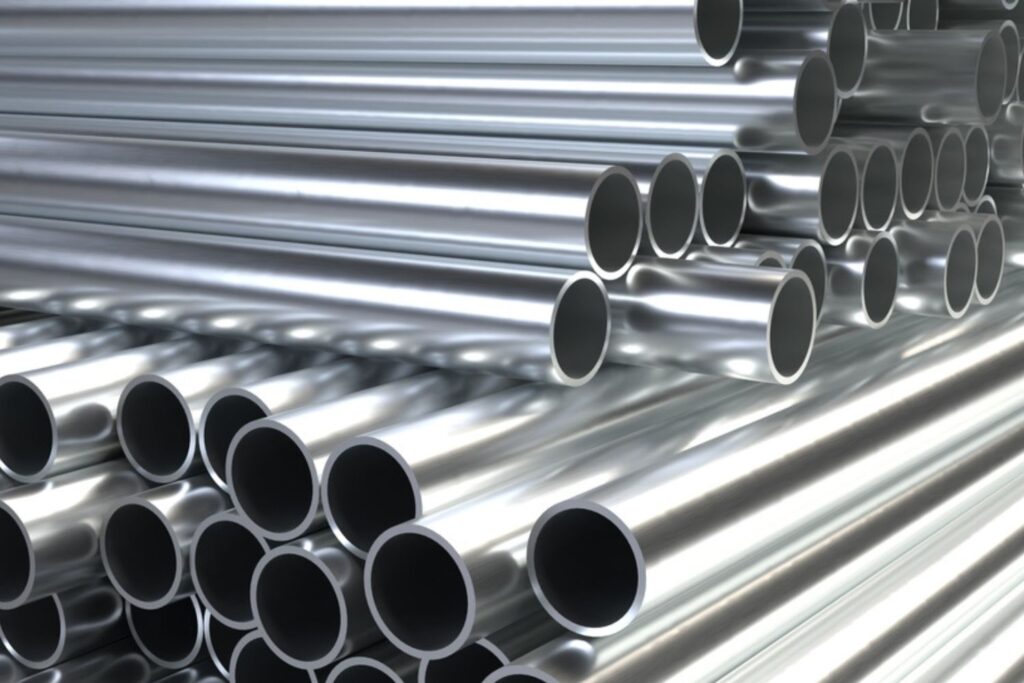Hot Dipped GI Seamless Pipes, stacked as a pile with mirror looks.